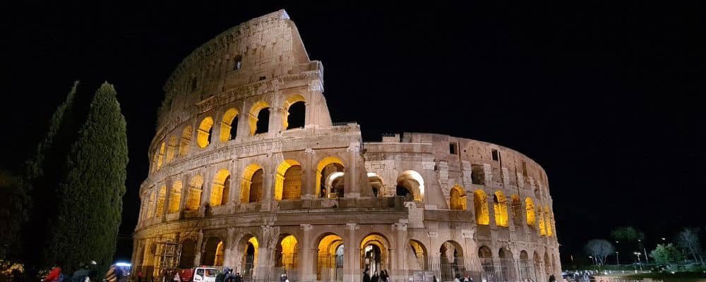 An iconic stone building at night in the Italian capital Rome. A perfect addition to a European gap year. 