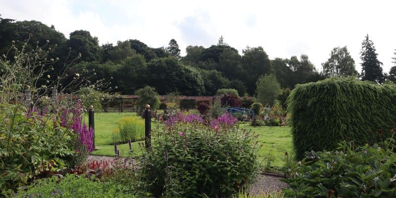 The beautiful walled gardens with a bridge