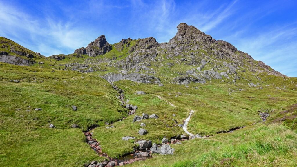 Stunning view of the distinct shape of The Cobbler, from a hiking trail in Scotland by Scott McLelland. 