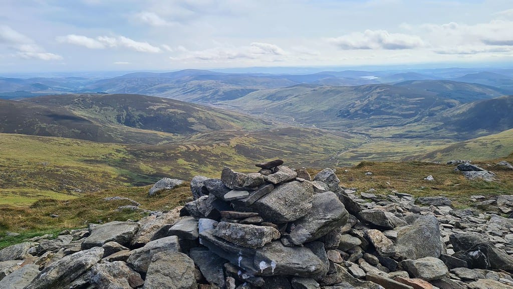 View from the summit of Mayar on a family hike up the Angus glens of Scotland.