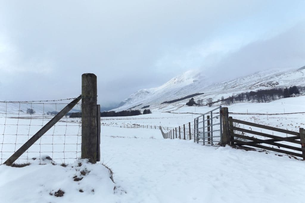 Loch Spean with Cairngorm mountains, ice and snow, Scotland by elgol from Getty Images