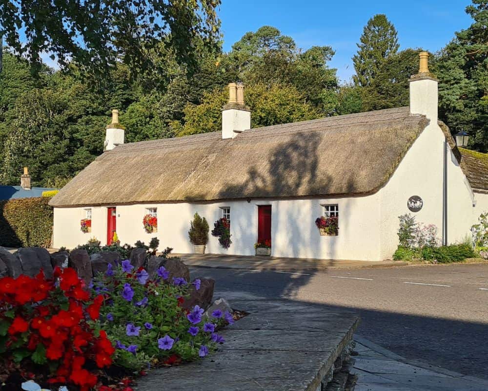 A thatched cottage in a Scottish village 