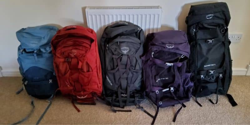 Family rucksacks lined up ready for a road trip adventure