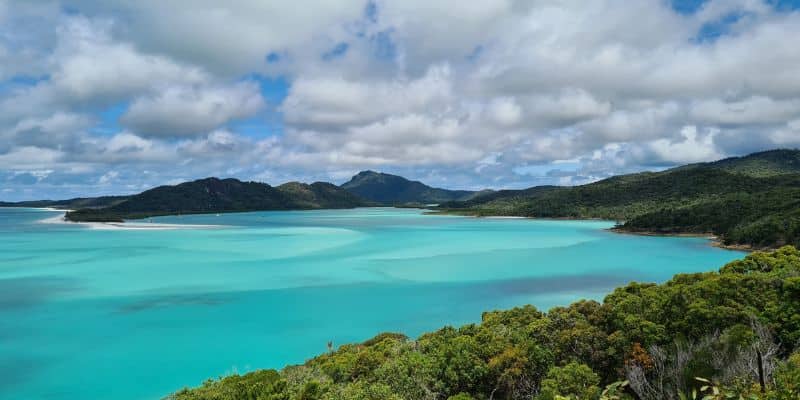 Pristine ocean view surrounded by rainforest in Whitsundays