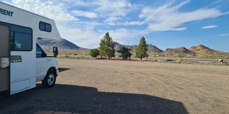 Rental motor home parked with a desert view 