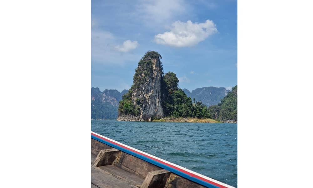 Limestone karsts viewed from a boat in Cheow Larn Lake, Thailand