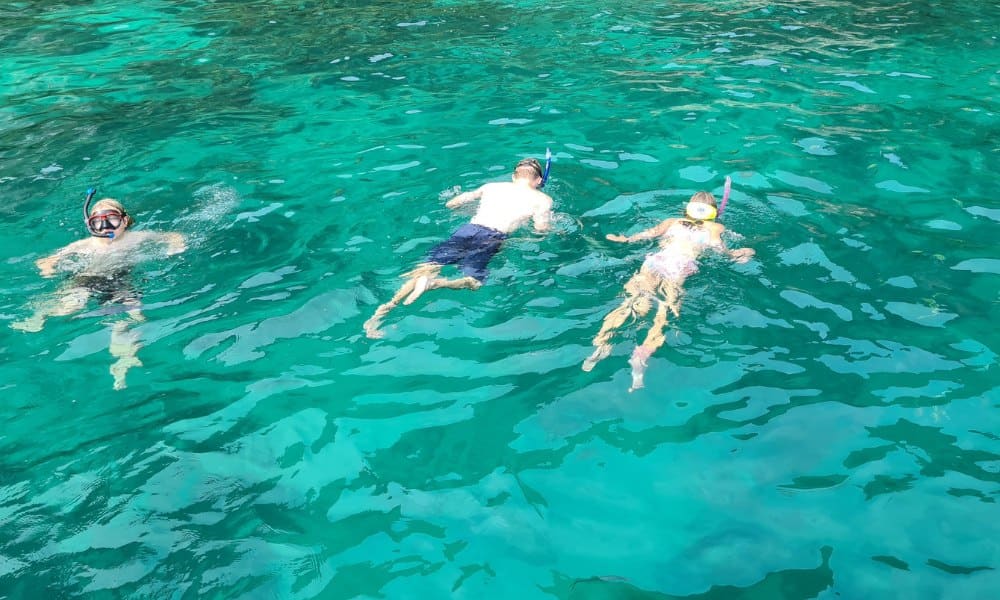 Kids snorkeling in the ocean