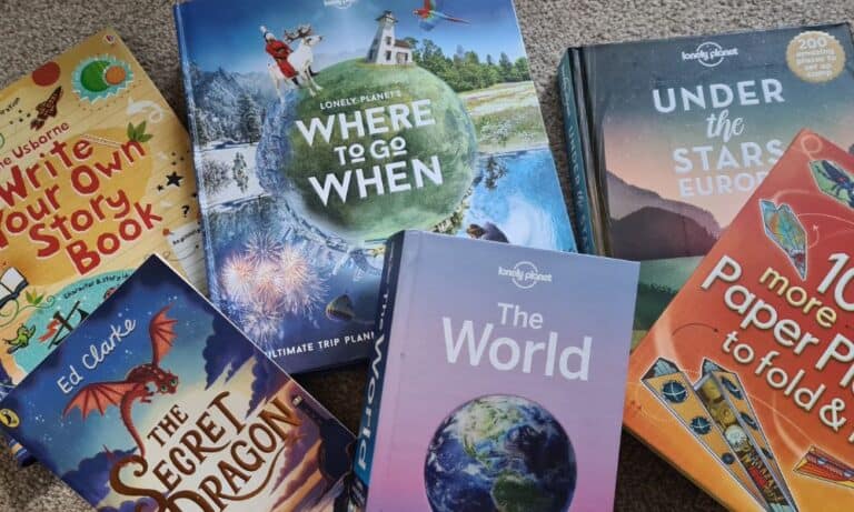 Collection of 6 travel and children's books for planning what age to travel with kids