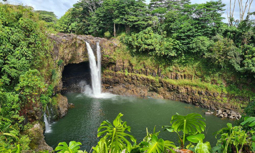 Waterfall in landscaped surroundings. Rainbows are seen in the morning.