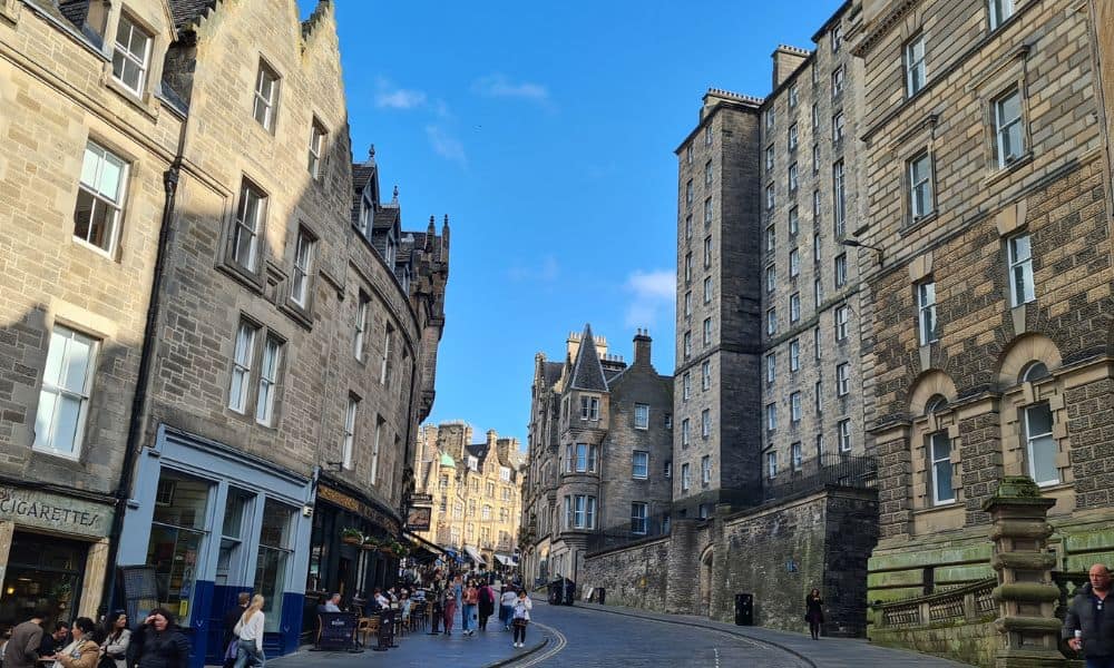 Tall buildings on a city street in Edinburgh