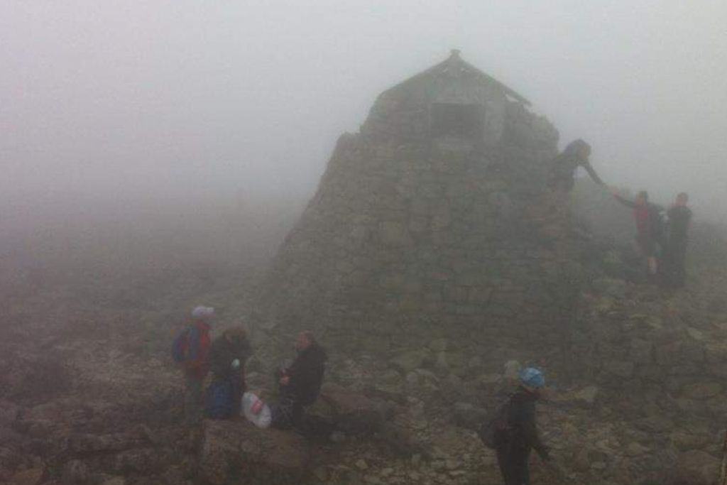 A misty view at the highest point of the UK while climbing Ben Nevis.