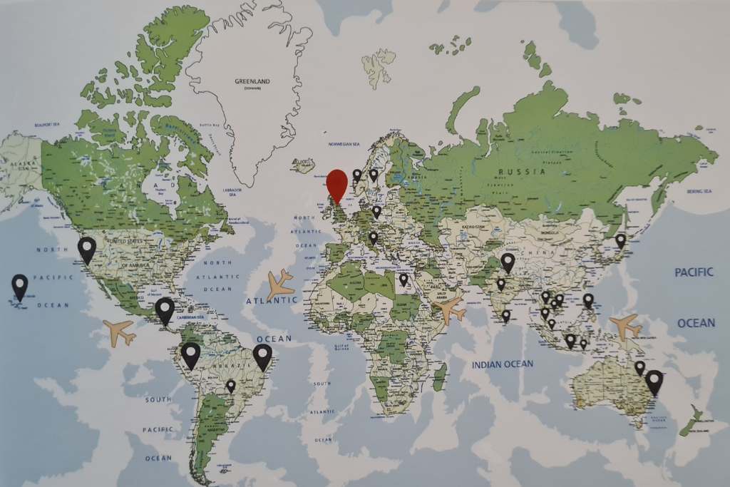 World map with markers for a family gap year itinerary. 