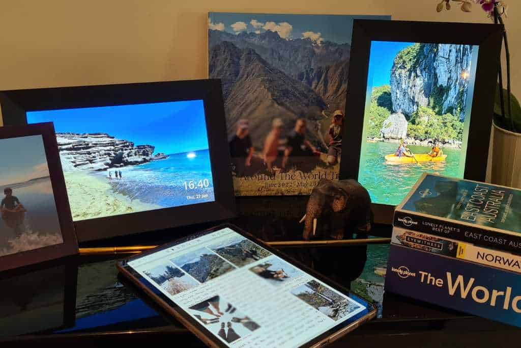 Home display of travel photos on digital photo frames, tablet, frames and travel books.