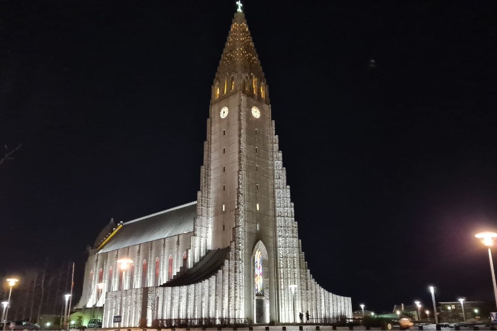 Iconic cathedral lit up at night in Iceland