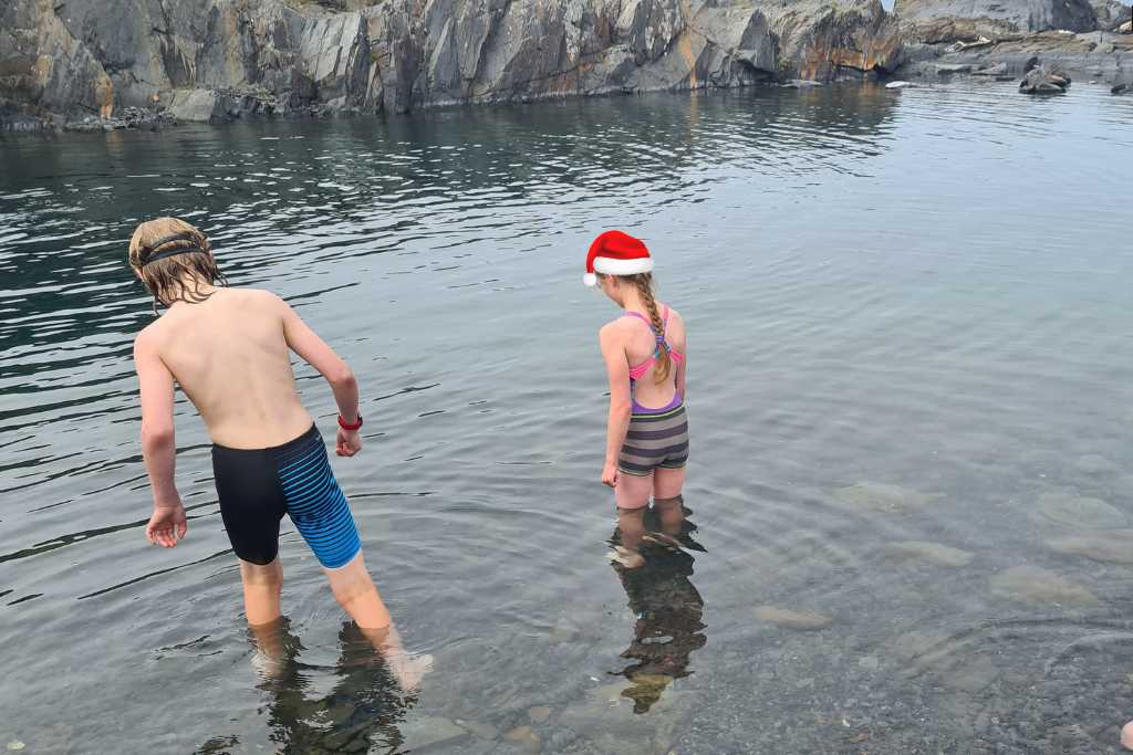 Kids going for a fresh water dip in Scotland, a Hogmanay tradition.