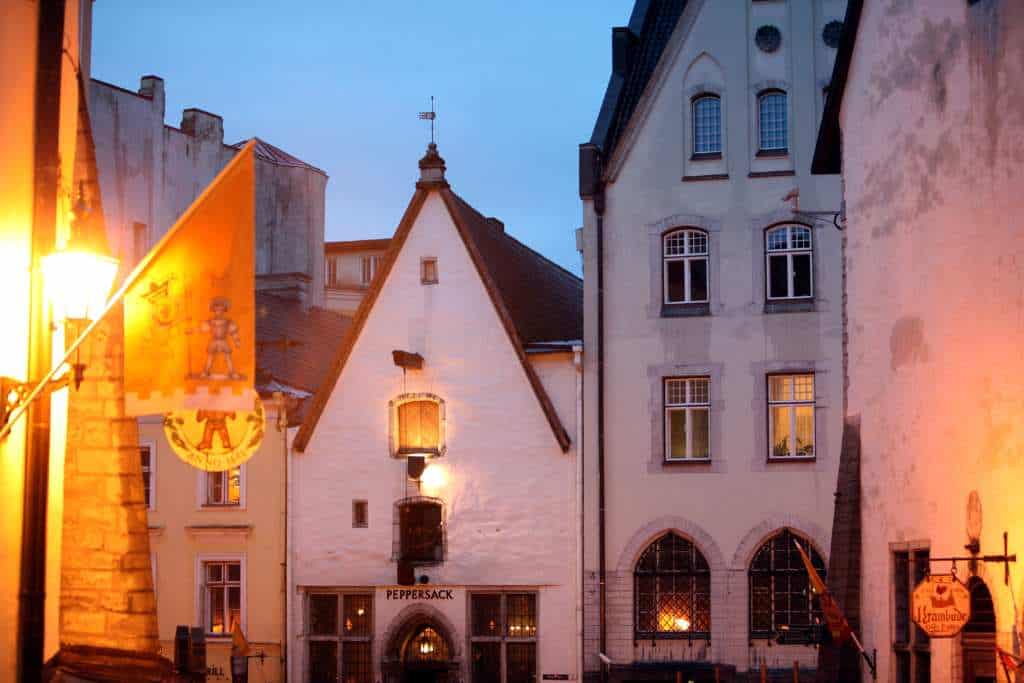 European town with white houses at dusk in winter.