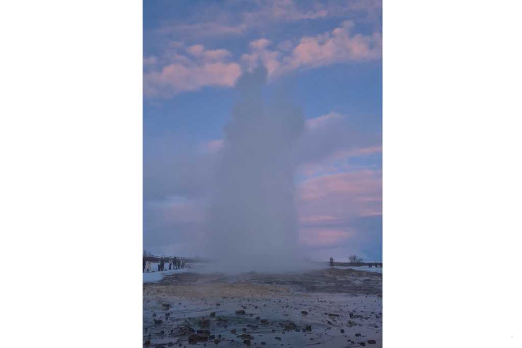 Erupting geyser shotting into the sky is a thing to do in Iceland with kids.