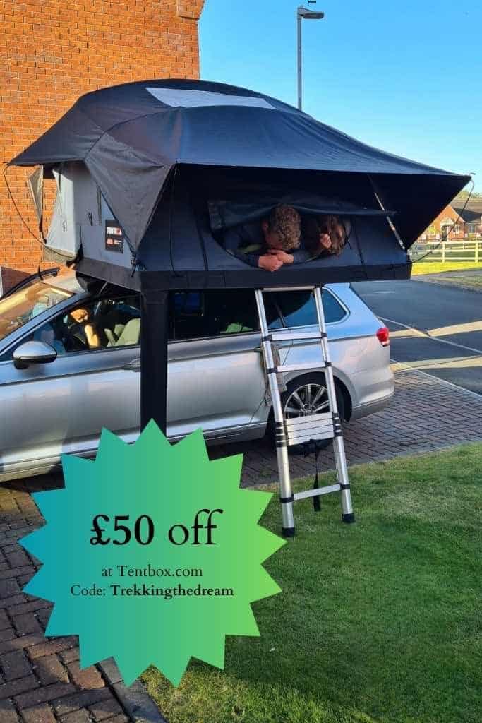 TentBox rooftop tent on a car with children inside.