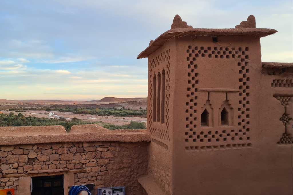 Close up detail of a mud building and surrounding landscape as a must see attraction in Morocco.