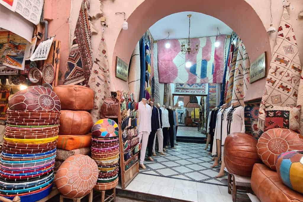 A traditional shop selling clothes and leather. Popular souvenirs to buy in Morocco.