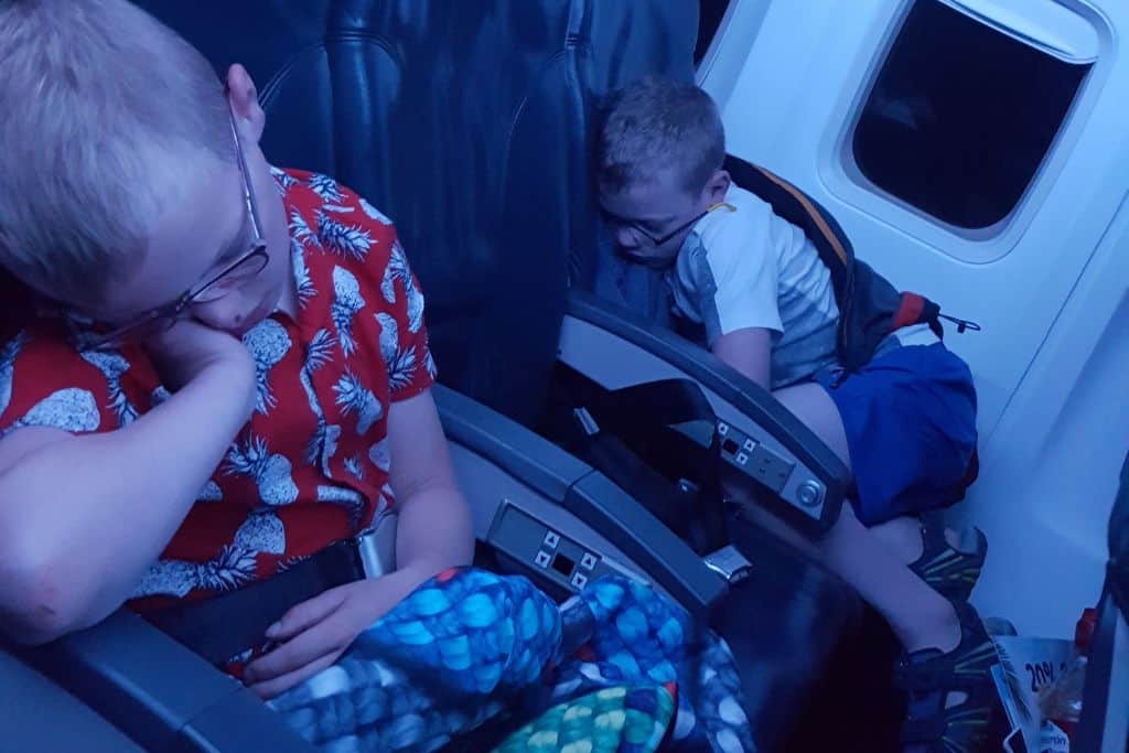 Sleeping kids on a night flight